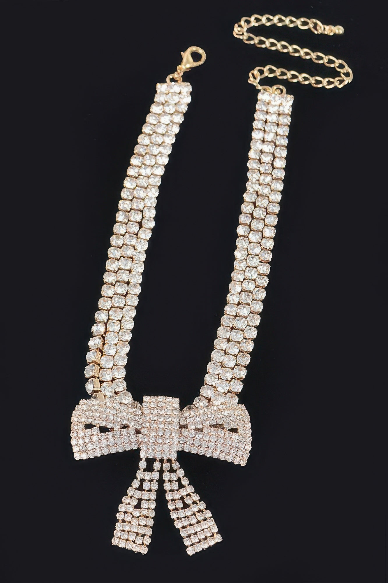 Golden Heir Selene Rhinestone Ribbon Choker featuring sparkling rhinestones on a sleek silver ribbon design.