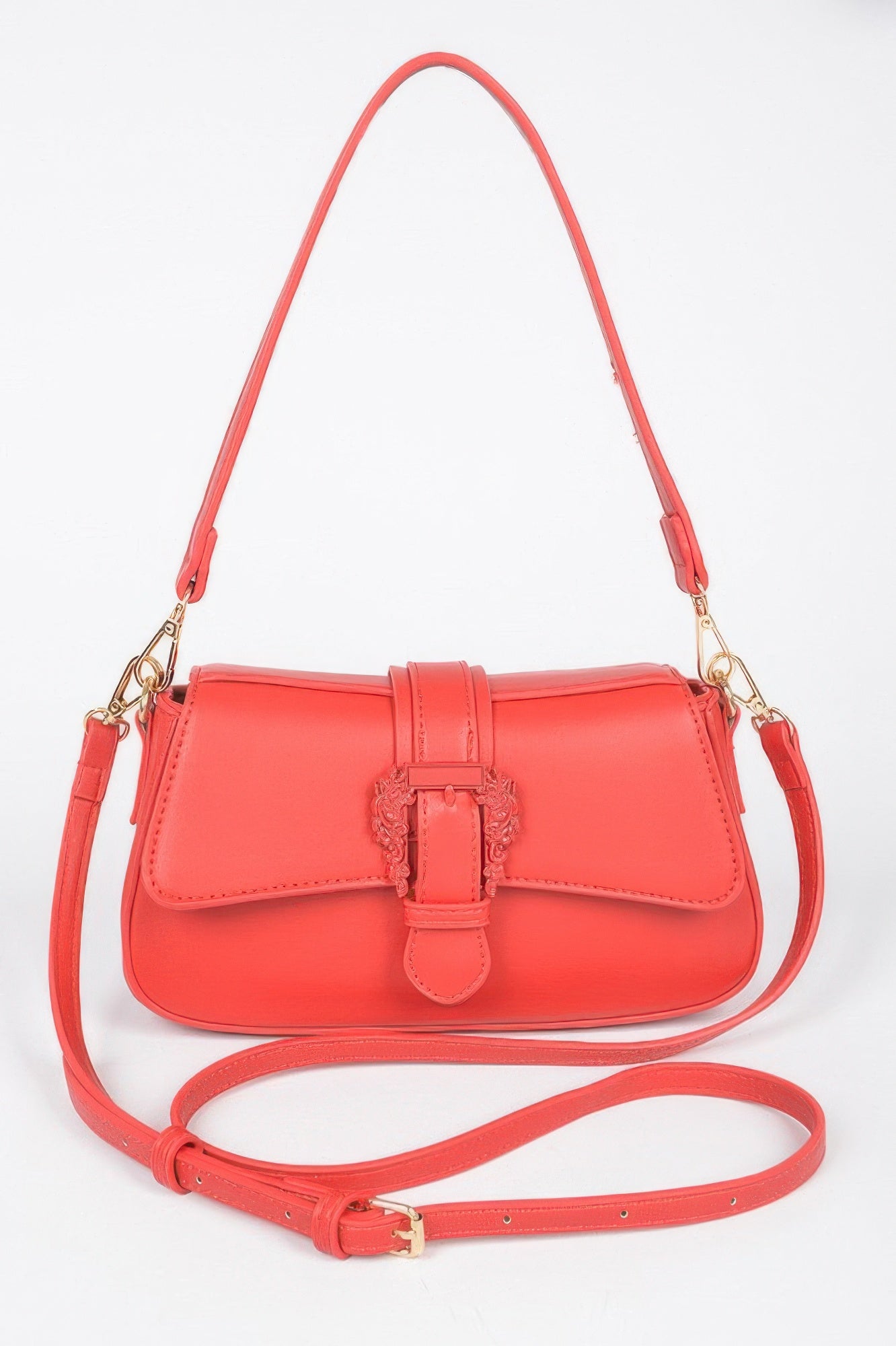 Golden Heir vegan metal buckle shoulder bag in black and gold with sleek design and adjustable strap.