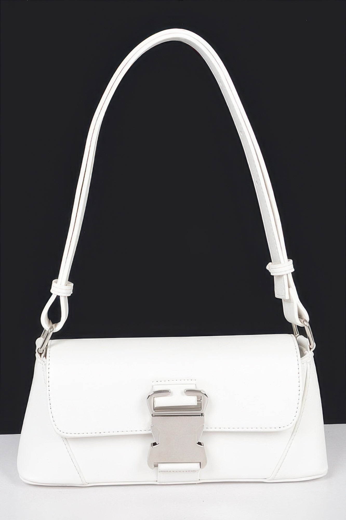 Golden Heir faux leather shoulder bag with metal buckle, black design, stylish and spacious for everyday use.
