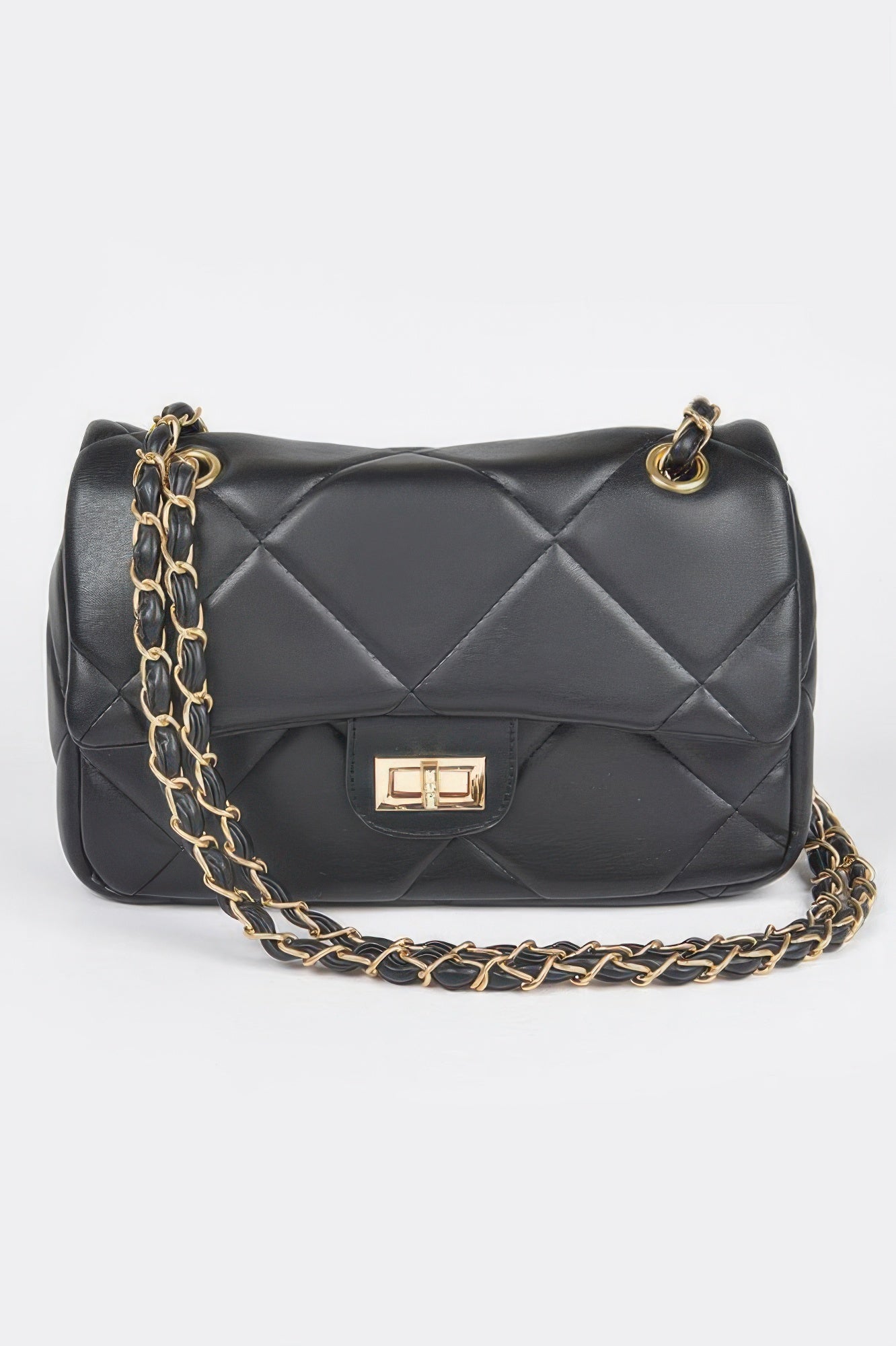 Golden Heir wide quilted shoulder bag in white with gold accents, featuring a stylish and spacious design.