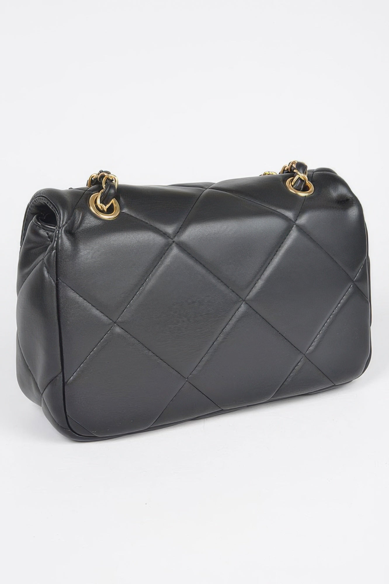 Golden Heir wide quilted shoulder bag in white with gold accents, featuring a stylish and spacious design for everyday use.