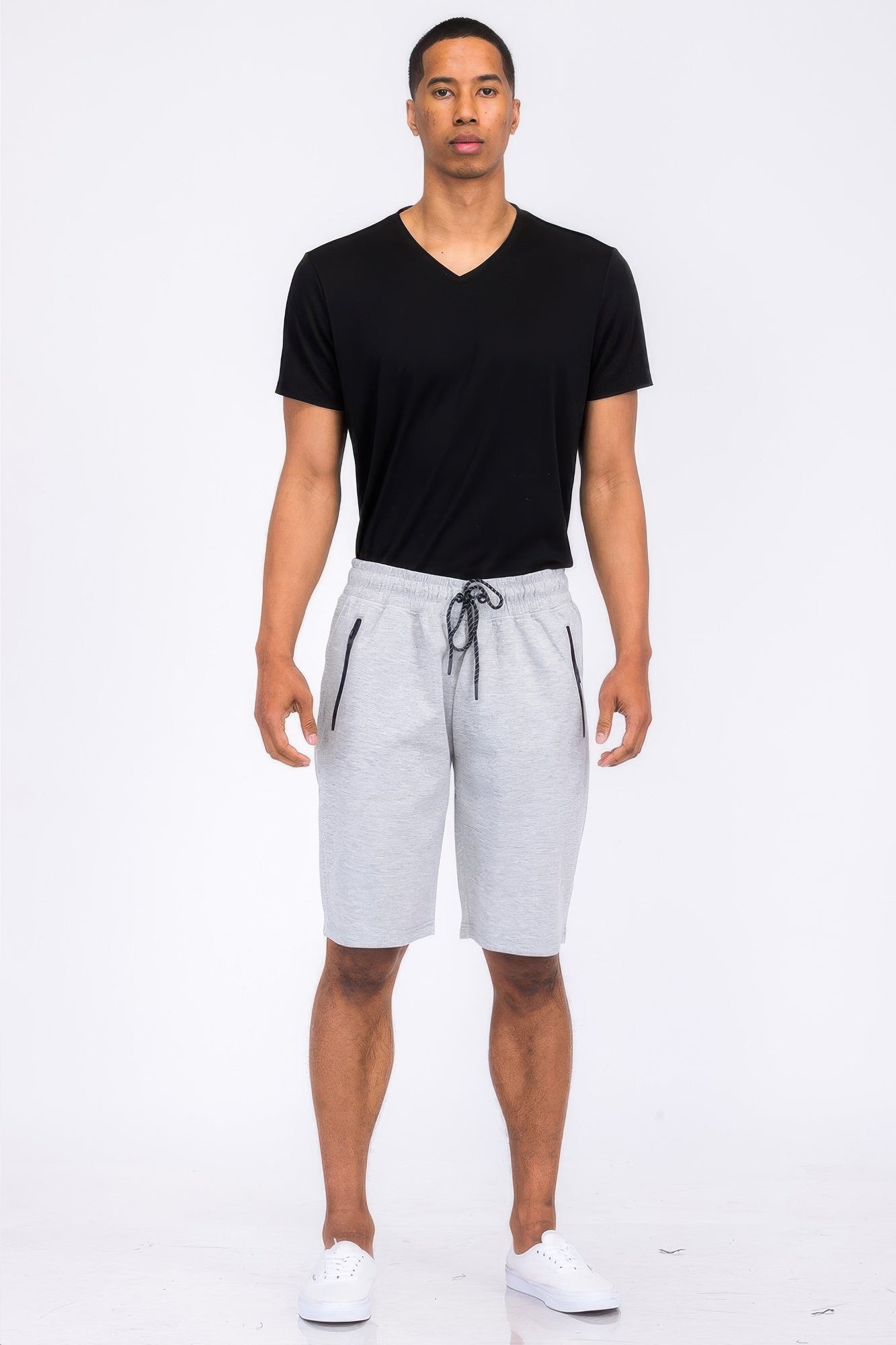 Black Golden Heir cotton blend lounge sweat shorts with an elastic waistband and relaxed fit, shown on a model.