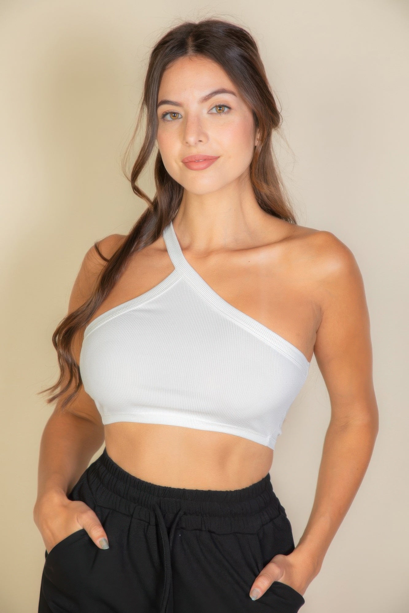 Black Golden Heir one-shoulder ribbed cropped tank top, showcasing a stylish, fitted design with a single shoulder strap.