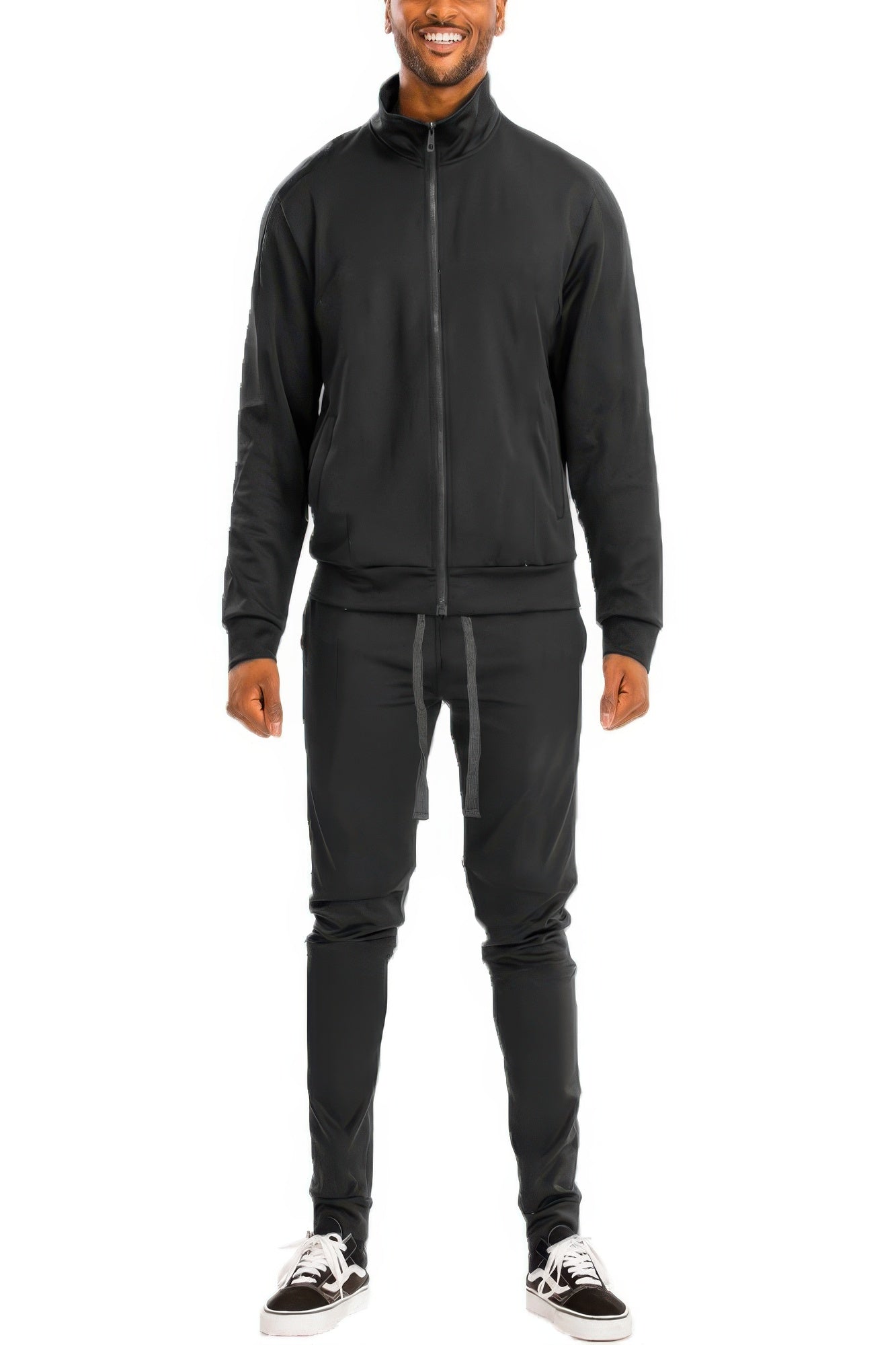Black Golden Heir full zip-up track jacket with solid design and gold accents, shown on a hanger.