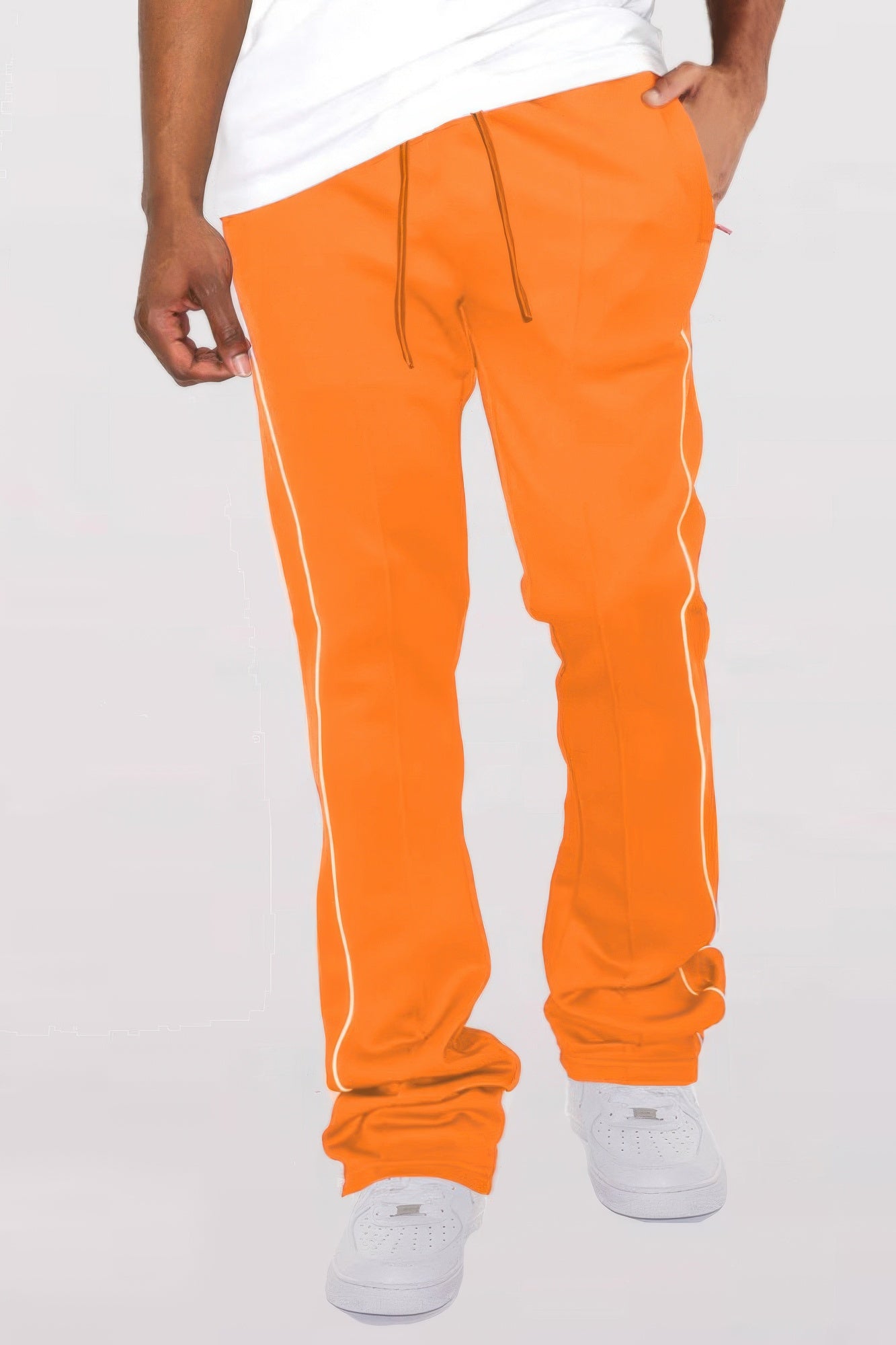 Black men's Golden Heir track pants with side pipe stacked flare design and elastic waistband, casual activewear for men.