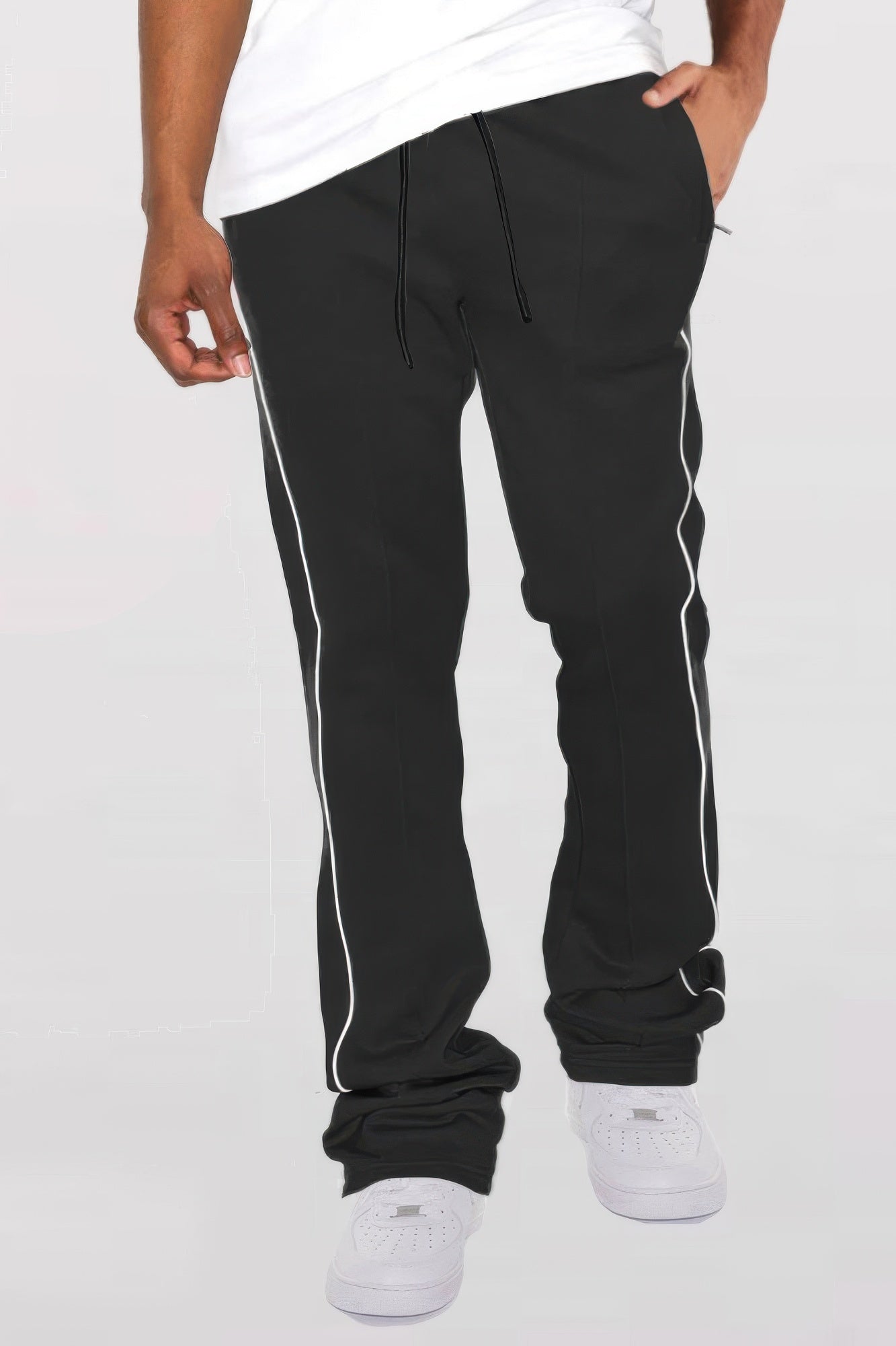 Black Golden Heir men's track pants with side pipe and stacked flare design, showcasing a stylish and modern athletic fit.