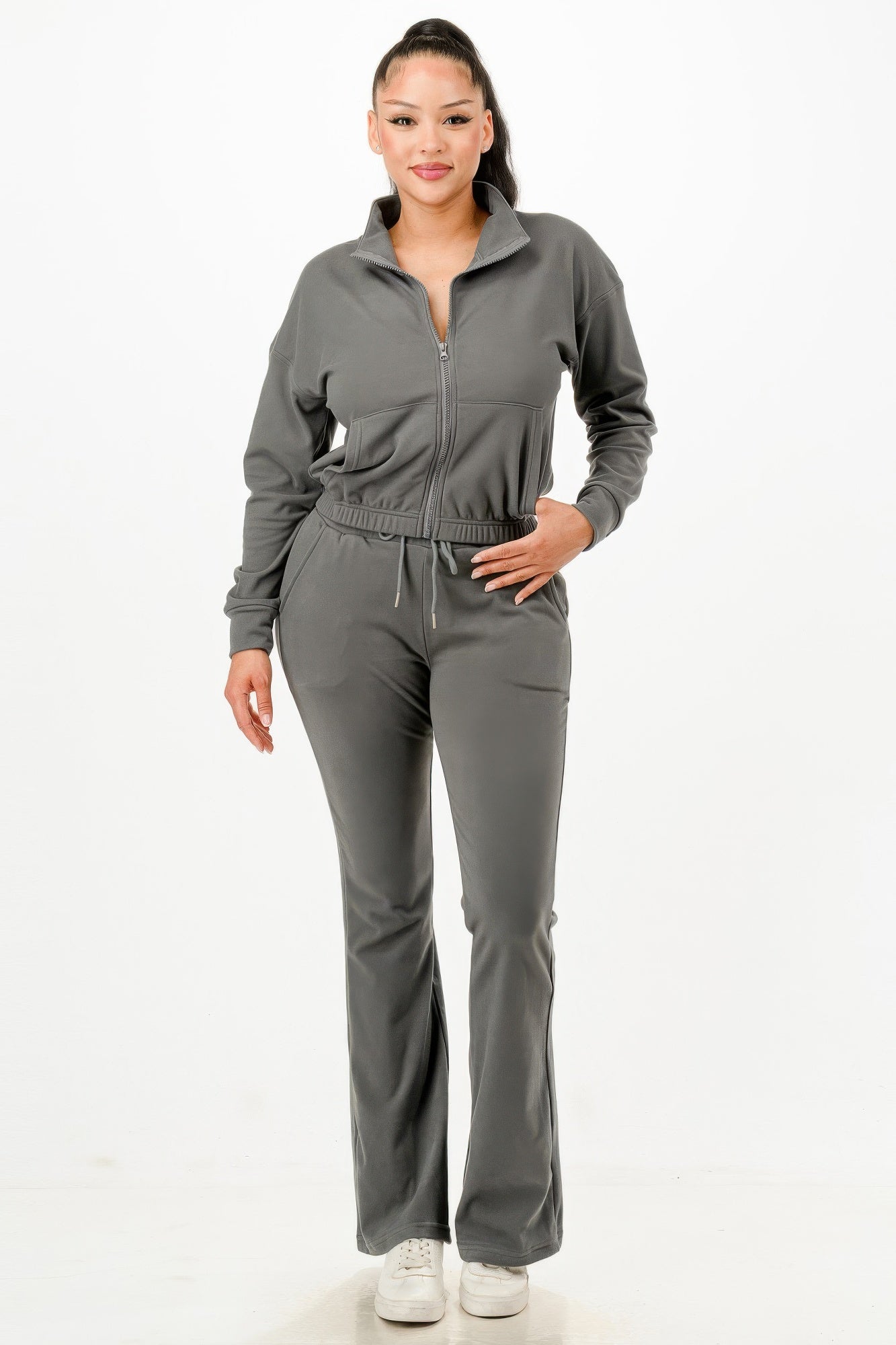 Golden Heir soft zip-up track suit set in gold, featuring a comfortable fit and sporty style, ideal for active wear.