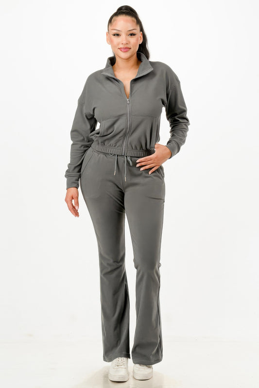 Golden Heir soft zip-up track suit set in gold, featuring a comfortable fit and sporty style, ideal for active wear.