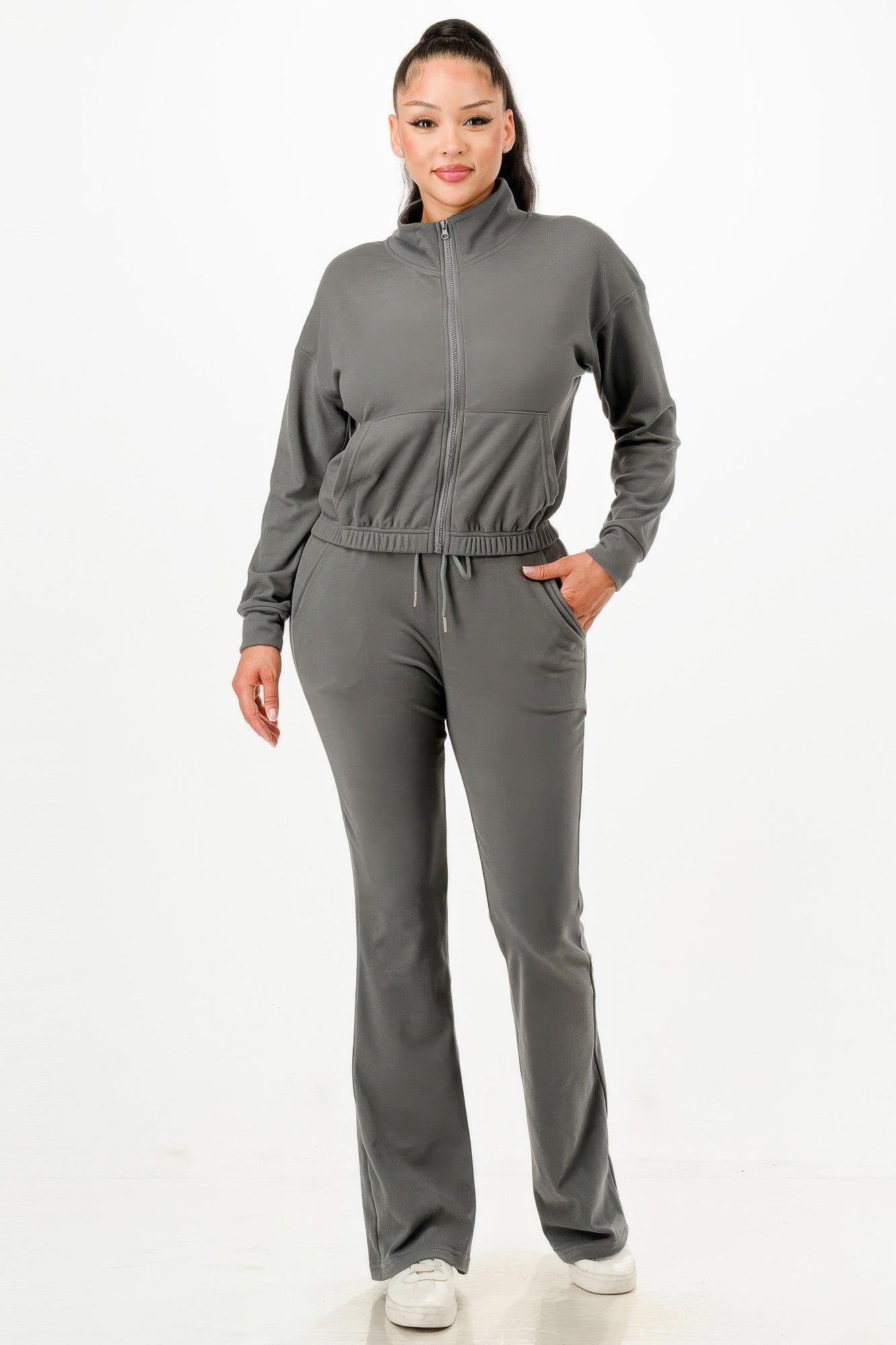 Golden Heir soft zip-up track suit set in gold with matching pants and jacket, displayed on a hanger.