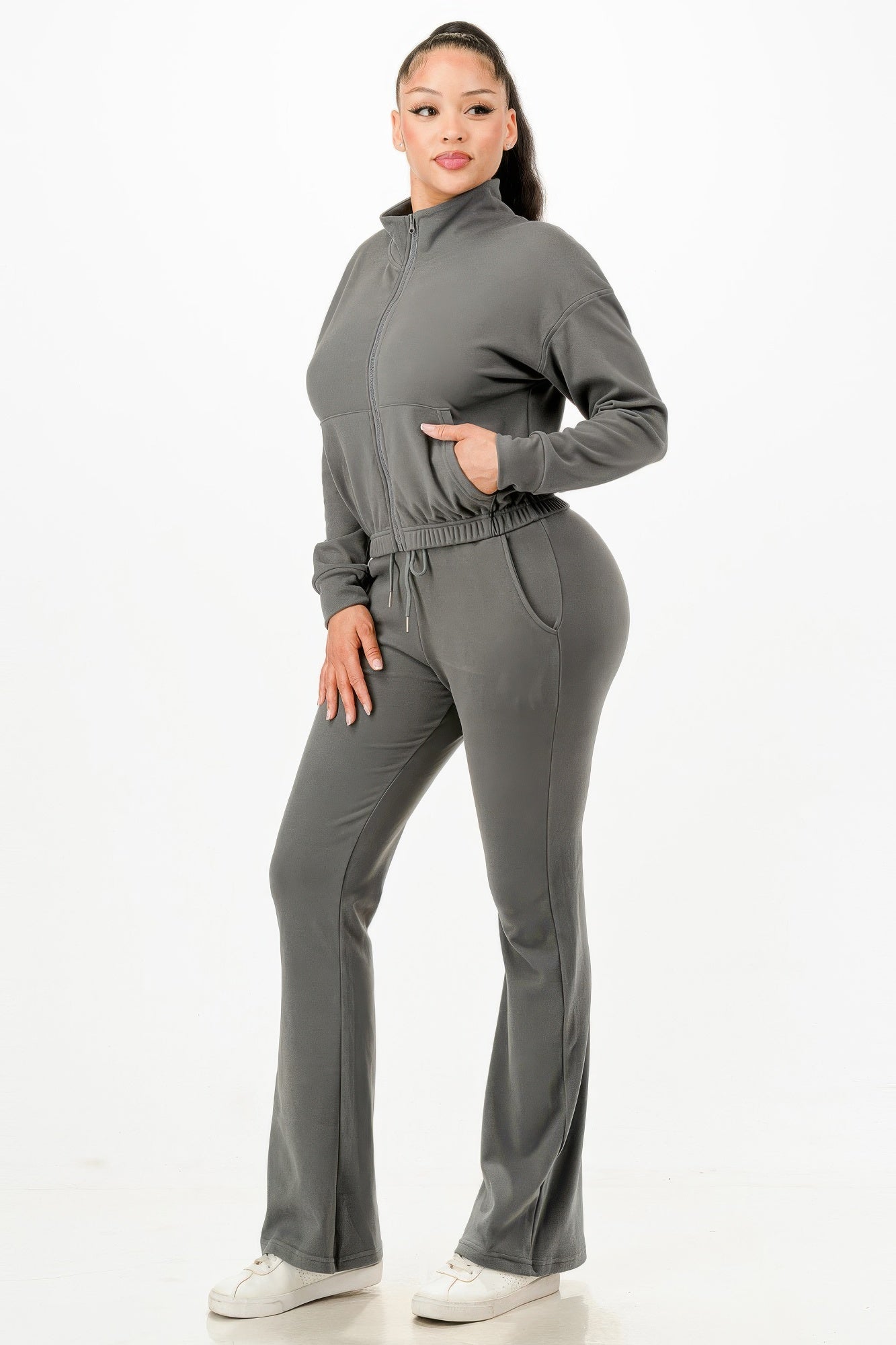 Golden Heir soft zip-up track suit set in gold color, featuring a comfortable fit and stylish design for active wear.