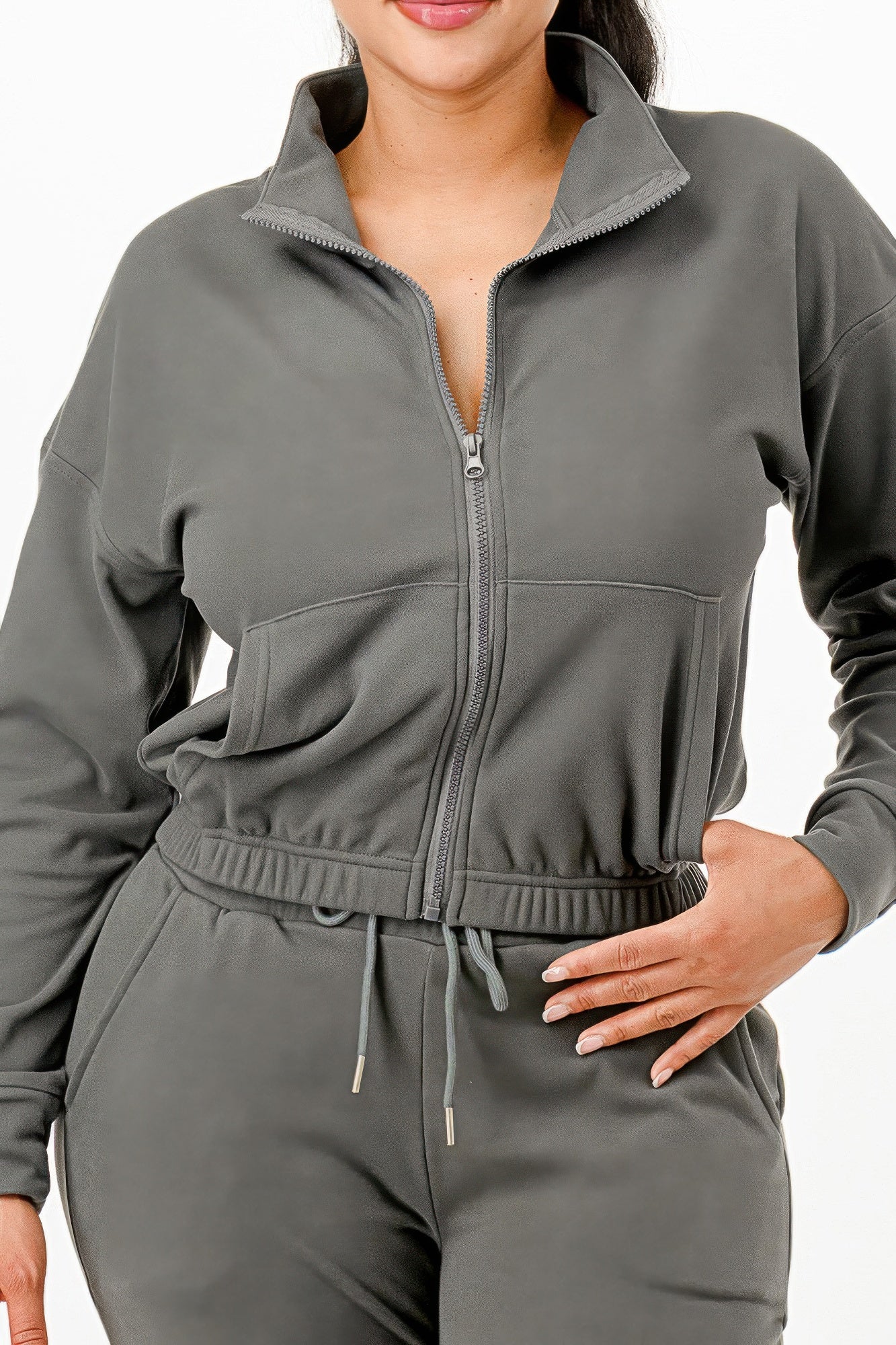 Golden Heir soft zip-up track suit set in gold, featuring a comfortable fit and sporty style for active wear.
