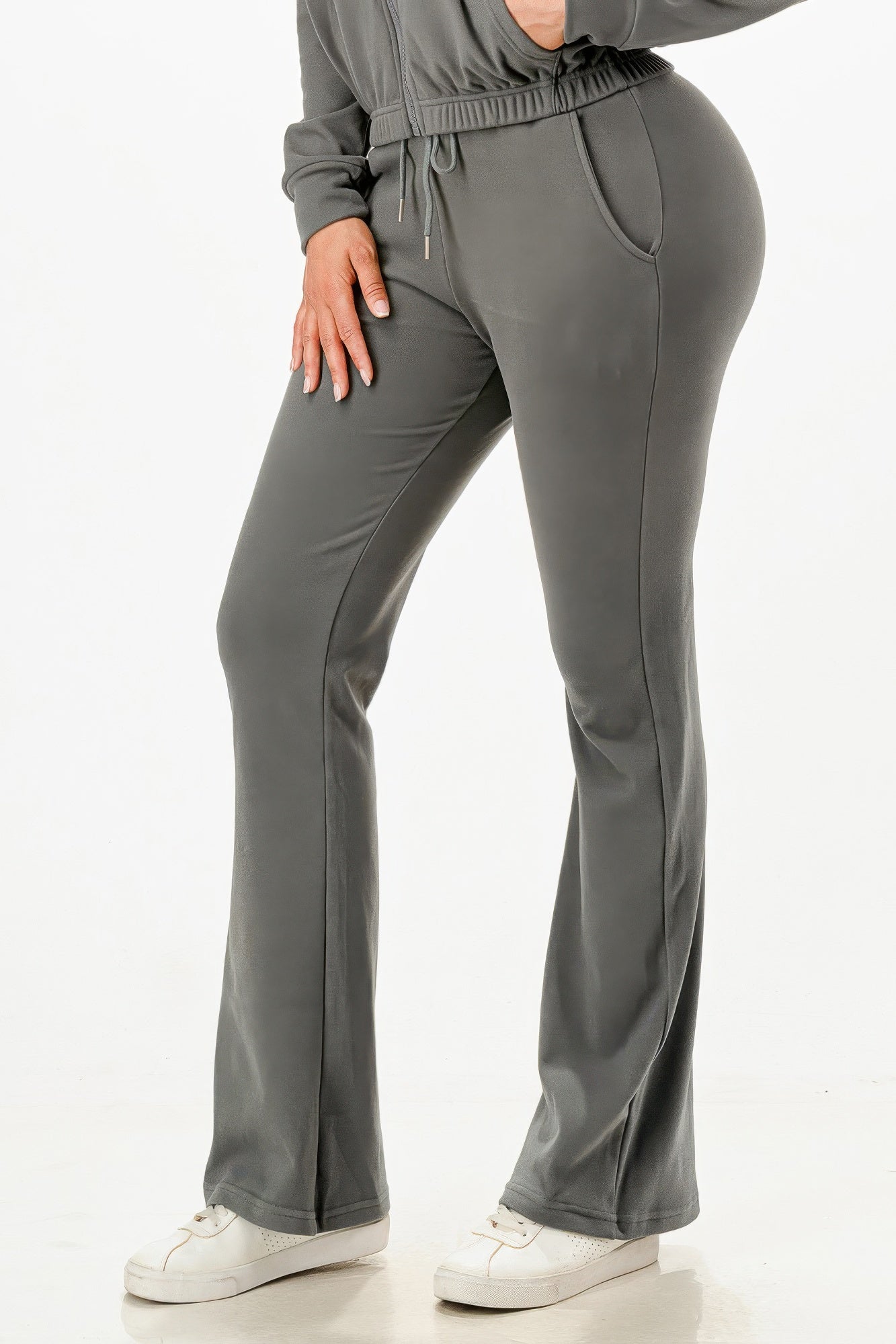 Golden Heir soft zip-up track suit set in gold, featuring a comfortable fit and stylish design for active wear.
