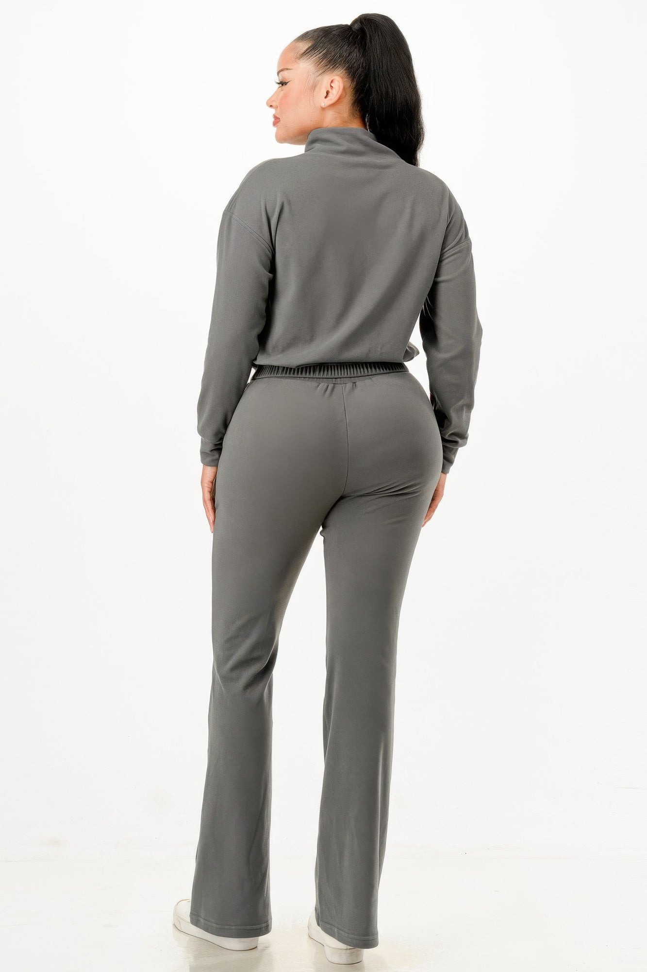 Golden Heir soft zip-up track suit set in gold, featuring a comfortable design with a full zip front and sporty style.