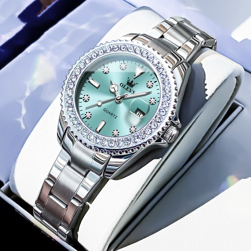Golden Heir stylish women's quartz watch with green leather strap, displayed on a green book, showcasing elegant business design.