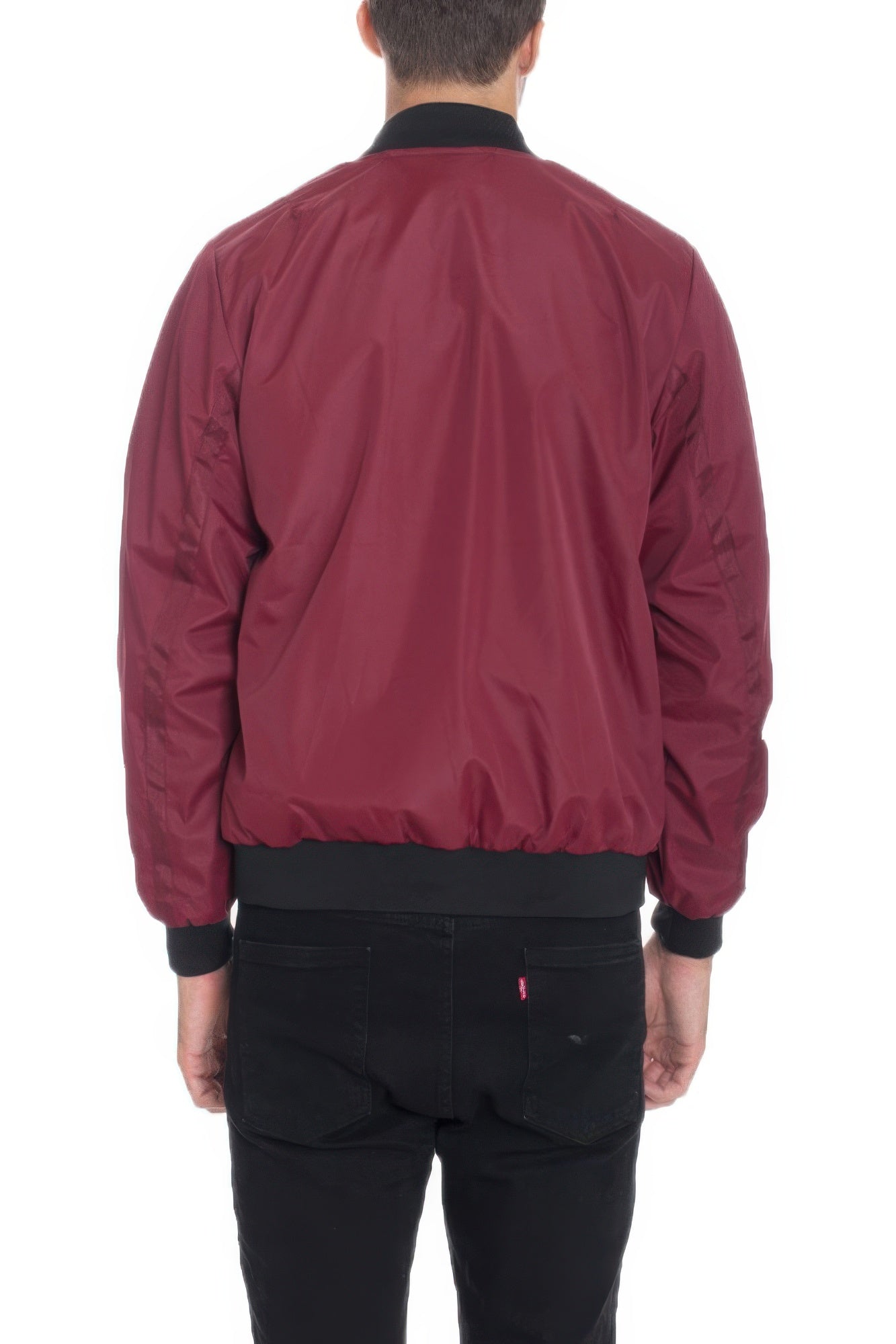 Golden Heir lightweight windbreaker jacket in black, shown on a model, featuring a sleek design and comfortable fit.