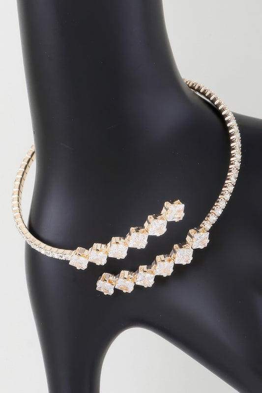 Golden Heir jeweled shiny star wrap bracelet featuring gold-tone and clear accents, designed for a stylish and elegant look.